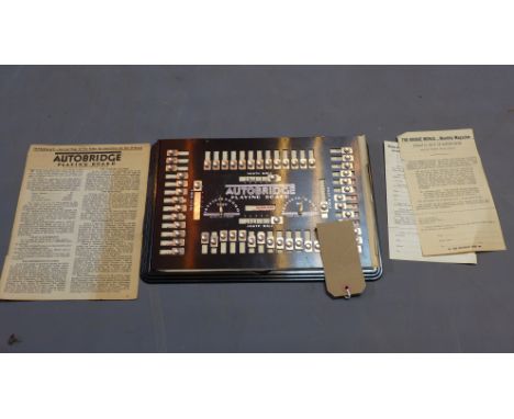 An Autobridge playing board, with instructions 