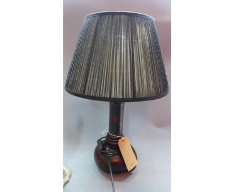 A mahogany table lamp, with black shade, H. 56cm 