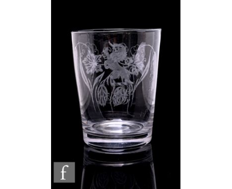 A large late Georgian tumbler circa 1800, the body engraved with an armorial with lion rampant above monogram with floral stu