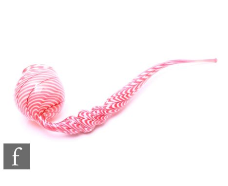 A late 19th Century Nailsea type uranium glass bubble pipe, with cupped bowl and knopped 'S' scroll stem, combed ruby through