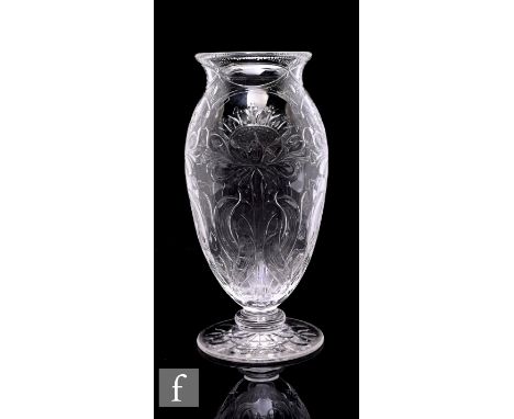 An early 20th Century Stevens &amp; Williams 'rock crystal' type vase of footed ovoid form with everted collar neck, skeletal