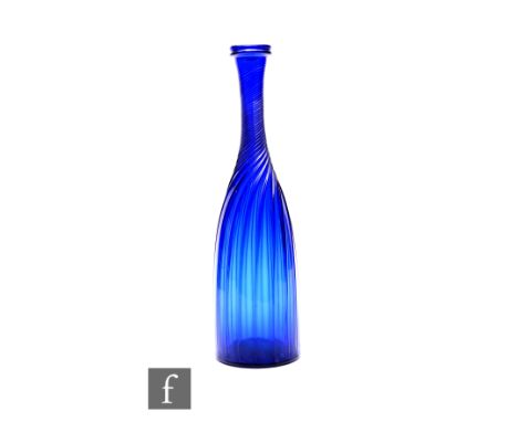 Unattributed Maker - A late Georgian Bristol Blue glass carafe, circa 1800, of bottle form with wrythen fluted slender bottle