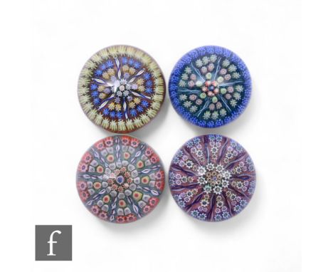Perthshire - A later 20th Century glass paperweight, of domed form, internally decorated in a cartwheel design comprising of 