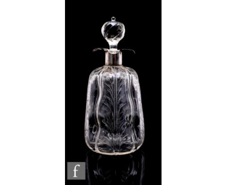 A late 19th Century Stevens &amp; Williams clear crystal decanter if shouldered ovoid form with dimple body and vertical ribs