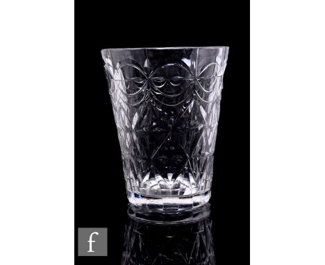 A late 18th Century tumbler of flared cylindrical form with dark metal, decorated with repeat flat cut decoration, height 13c