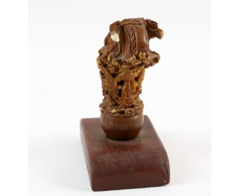 Ornate ivory handle carved and pierced with a horse's head amongst flowers and foliage, 10cmPLEASE NOTE: THIS ITEM CONTAINS O