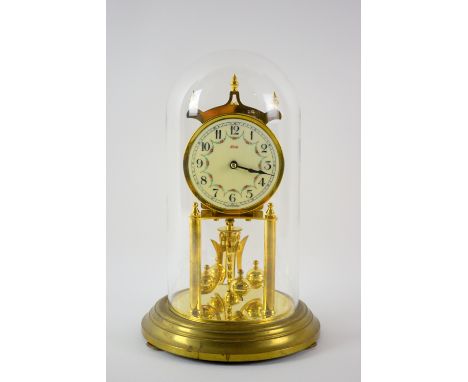 400 day anniversary clock by Kern &amp; Sohne with four ball pendulum, 19cm dia porcelain dial with Arabic numerals, mounted 