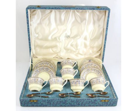 Royal Worcester 'Lady Evelyn' coffee service for six, including cups and saucers with silver plated spoons in fitted case bea