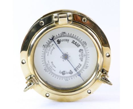 German Schatz brass Ships type wall clock 17cm diameter, two similar quartz clocks and oak case barometer 