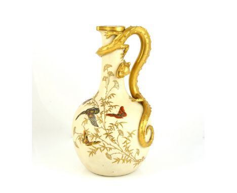 Royal Worcester blush ivory ewer with serpent handle, painted with butterflies and flowers, date stamp for 1888, 30cm high 