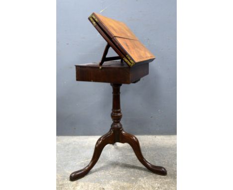19th century mahogany  reading stand with adjustable  reading slope  opening out  to reveal a baize surface to a drawer on co