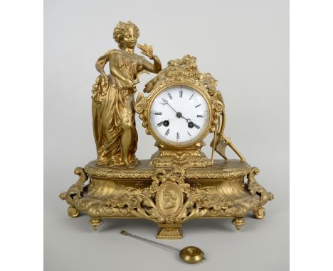 Gilt metal mantel clock with twin train movement 35cm high  
