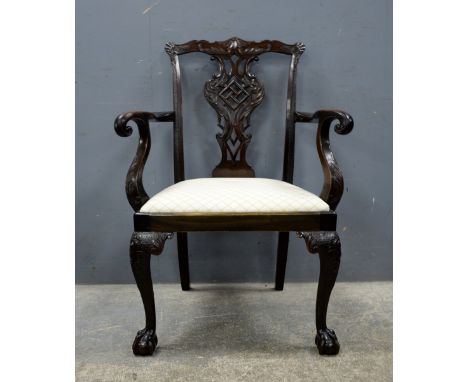 19th Century mahogany Chippendale style armchair with pierced slat back dropping seats on cabriole legs to ball and claw feet