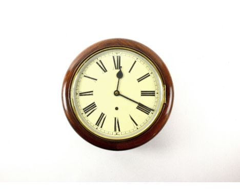 Circular wall clock in mahogany case with 26cm  dia painted dial with Roman numerals and brass bezel. 8 day movement by W&amp