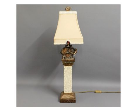 A spelter style elephant on pillar table lamp with shade, 33in high inclusive 