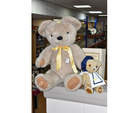 A LARGE MERRYTHOUGHT CHAMPAGNE PLUSH BEAR, plastic eyes, vertically stitched nose, jointed body, label to pad of left paw and