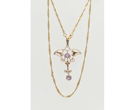 A 9CT GOLD LAVALIER PENDANT NECKLACE, open work floral drop pendant, set with two circular cut amethysts, fitted with a taper