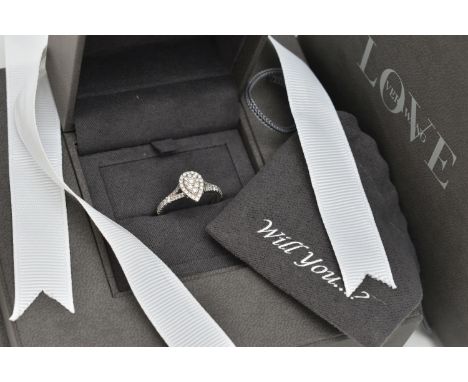 A 'VERA WANG', 18CT WHITE GOLD, DIAMOND SET RING, of a pear cut design, set with a cluster of round brilliant cut diamonds, t