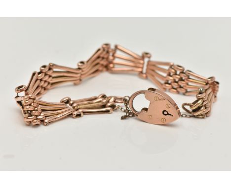 A ROSE METAL GATE BRACELET, fancy link bracelet, fitted with a heart padlock clasp, stamped '9ct FULL', length 200mm, base me