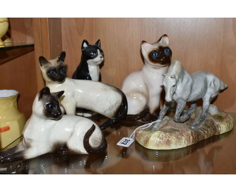 A GROUP OF CERAMIC ANIMAL FIGURES, comprising a Beswick Camargue Wild Horse figure on a ceramic base, a Beswick Siamese Cat -