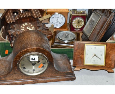 A BOX AND LOOSE CLOCKS AND BAROMETER, including a modern cuckoo clock fitted with Reuge musical movement playing Edelweiss, w