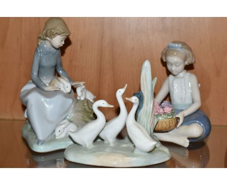 THREE LLADRO AND NAO FIGURES, comprising Lladro 'Arranging Flowers' model no 8574, sculptor Raul Rubio, issued in 2011, with 