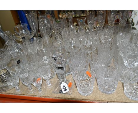 A QUANTITY OF CUT CRYSTAL, comprising a pair of Stuart Crystal 'cascade' pattern candle sticks, a Royal Doulton compote, Dart