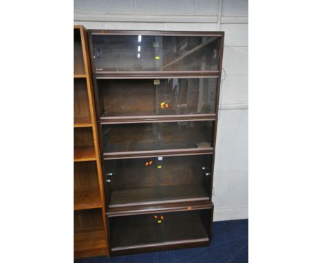 A SIMPLEX FIVE SECTION MAHOGANY STACKING BOOKCASE, all with double glazed sliding doors, one section with an adjustable shelf