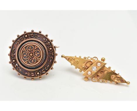 TWO LATE VICTORIAN BROOCHES, the first of marquise outline, the central diagonal panel set with an old curt diamond flanked b