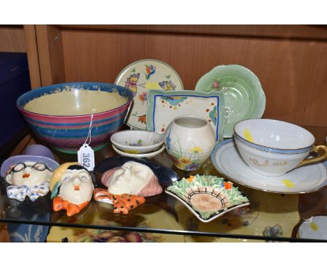 A 'FANTASQUE' DESIGN DISH BY CLARICE CLIFF AND OTHER ART DECO CERAMICS, the dish made by Wilkinson Ltd. has pink, blue, purpl