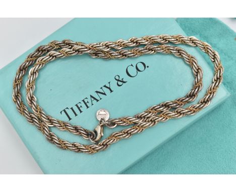 A 'TIFFANY &amp; CO' BI COLOUR ROPE TWIST NECKLACE, silver rope twist chain with a fine intertwined yellow metal trace chain,