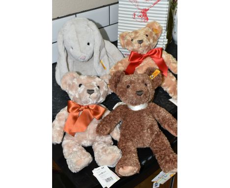 THREE STEIFF YEAR BEARS 2020-2022 AND A STEIFF SOFT AND CUDDLY FRIENDS 'HOPPIE', all with buttons in ears tags and swing tags