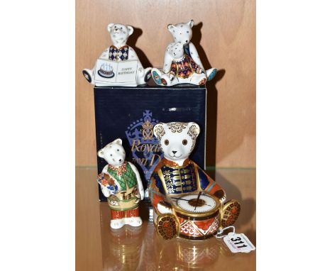 A BOXED ROYAL CROWN DERBY 'DRUMMER BEAR' PAPERWEIGHT AND THREE MINIATURE TEDDIES FIGURES, comprising Drummer Bear paperweight