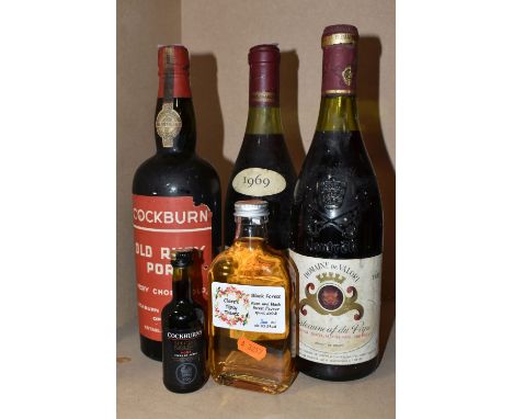 WINE &amp; PORT, three botttles comprising one bottle of Beaune-Greves 1er Cru 1969, one bottle of Domaine De Valori Chateaun