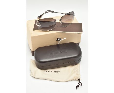 A BOXED PAIR OF 'LOUIS VUITTON' RIMLESS SUNGLASSES, laser cut pattern to the edge of the graduated tinted lenses, signed 'Lui