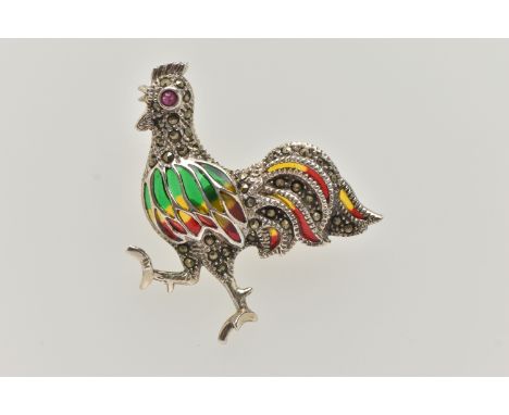 A WHITE METAL PLIQUE A JOUR BROOCH, in the form of a cockerel, marcasite detail to the body with a ruby eye, red, green and y