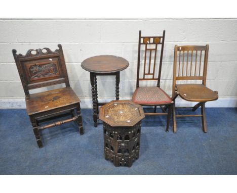 A 17TH CENTURY OAK LANCASHIRE CHAIR/HALL CHAIR, with scrolled crest, backrest depicting a mythical winged creature, on turned