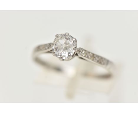 A PLATINUM SINGLE STONE DIAMOND RING, the old cut diamond in an eight claw setting, with three single cut diamonds to each sh