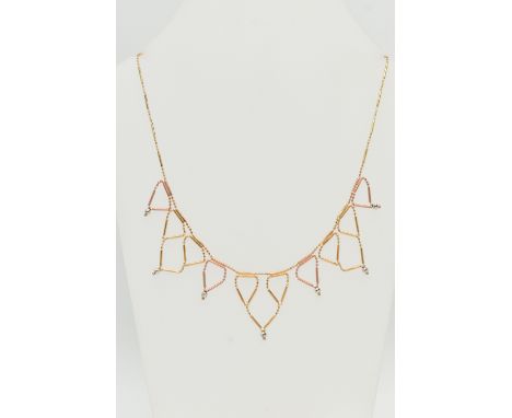 A BI-COLOUR FRINGE NECKLACE, the faceted and tubular design chain suspending triangular fringe drops with faceted bead detail