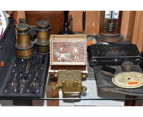 A GROUP OF LATE 19TH/EARLY 20TH CENTURY TREEN AND BINOCULARS, comprising an ebony 'Egg' sock darner, an onyx desk top pen hol