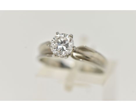 A WHITE METAL SINGLE STONE DIAMOND RING, round brilliant cut diamond in a six claw setting, estimated diamond weight 0.80ct, 