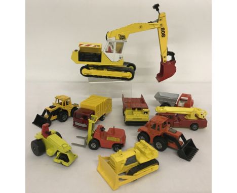  Together with 9 small Matchbox/Lesney 1970/80's construction vehicles. To include: fork lift, dumper trucks and caterpillar 