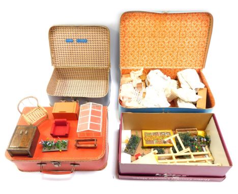 A group of doll's house furniture, together with three vintage suitcases.