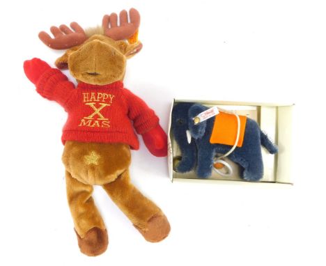 A Steiff Pull-a-long elephant toy, and a Happy Xmas Reindeer. (2)