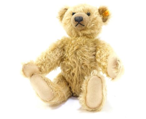 A Steiff plush blonde jointed Teddy Bear, 42cm high.