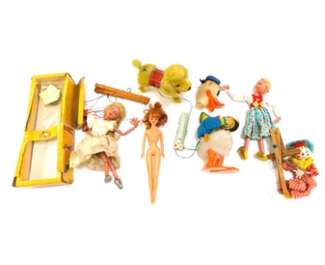 Puppets, comprising a Pelham Puppet of a lady, Donald Duck puppet and others, 1 boxed. (AF)