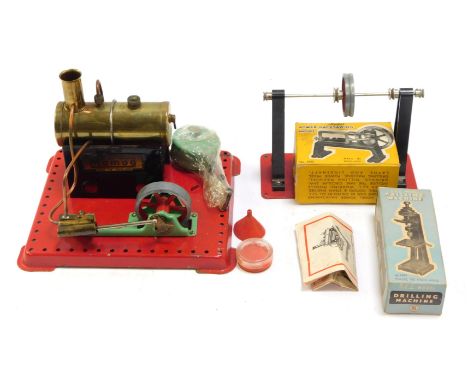 A Mamod steam traction engine, drilling machine and a power hacksaw, with two boxes. (1 box)