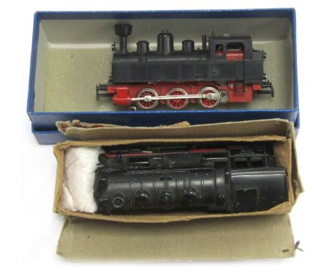 Two OO gauge locomotives, comprising a Marklin BR black livery locomotive, and a Marklin RM800 loco, boxed. (2)