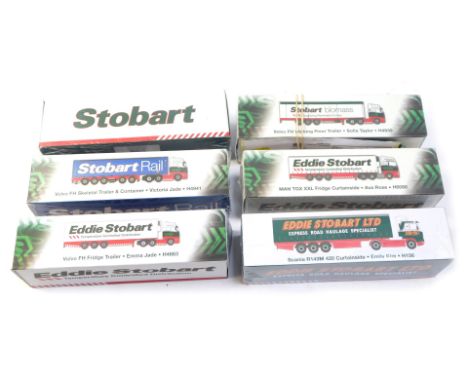 Six Eddie Stobart diecast models, 1:76 scale, comprising Scania Irizar PB Executive Coach Laura Abby, Volvo FH skeletal trail