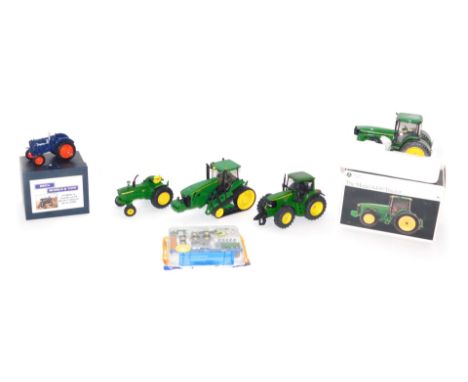 Diecast agricultural vehicles, comprising a Precision Classics model 8400 John Deere tractor, boxed, a Megs Models and Toys F